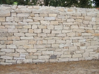 Contruction d'un mur de clôture en pierre de granit à Brétignolles sur Mer